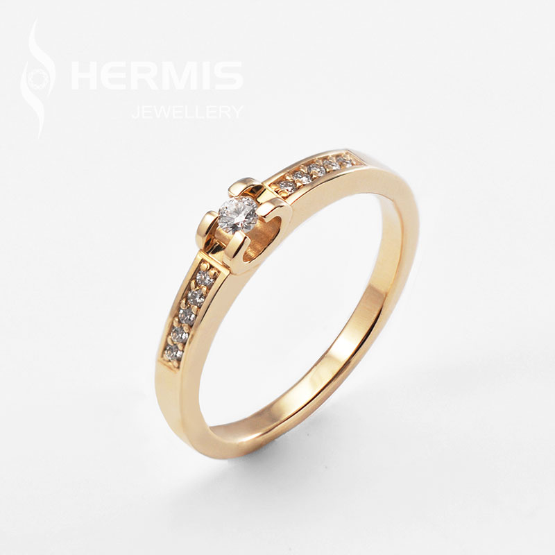 [:lt]Auksinis sužadėtuvių žiedas su briliantų eilutėmis[:en]Golden engagement ring with lines of diamonds[:]